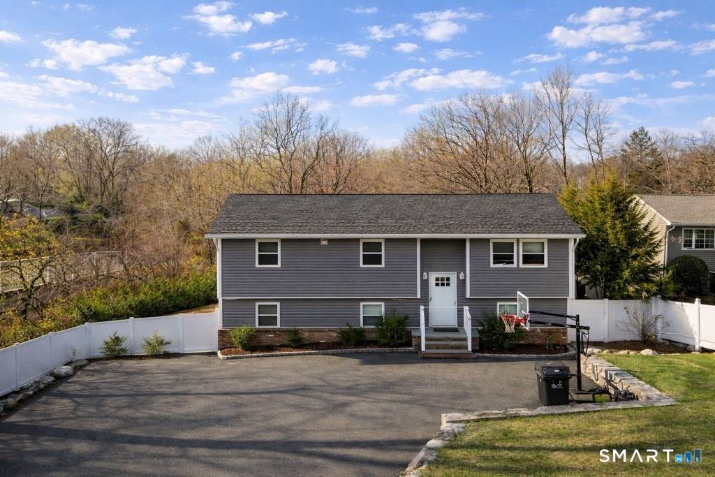 Completely reimagined in 2020, this turn key residence at 26 Three Lakes Drive offers the perfect blend of modern design, comfort, and flexibility in one of Stamford's most peaceful residential ...