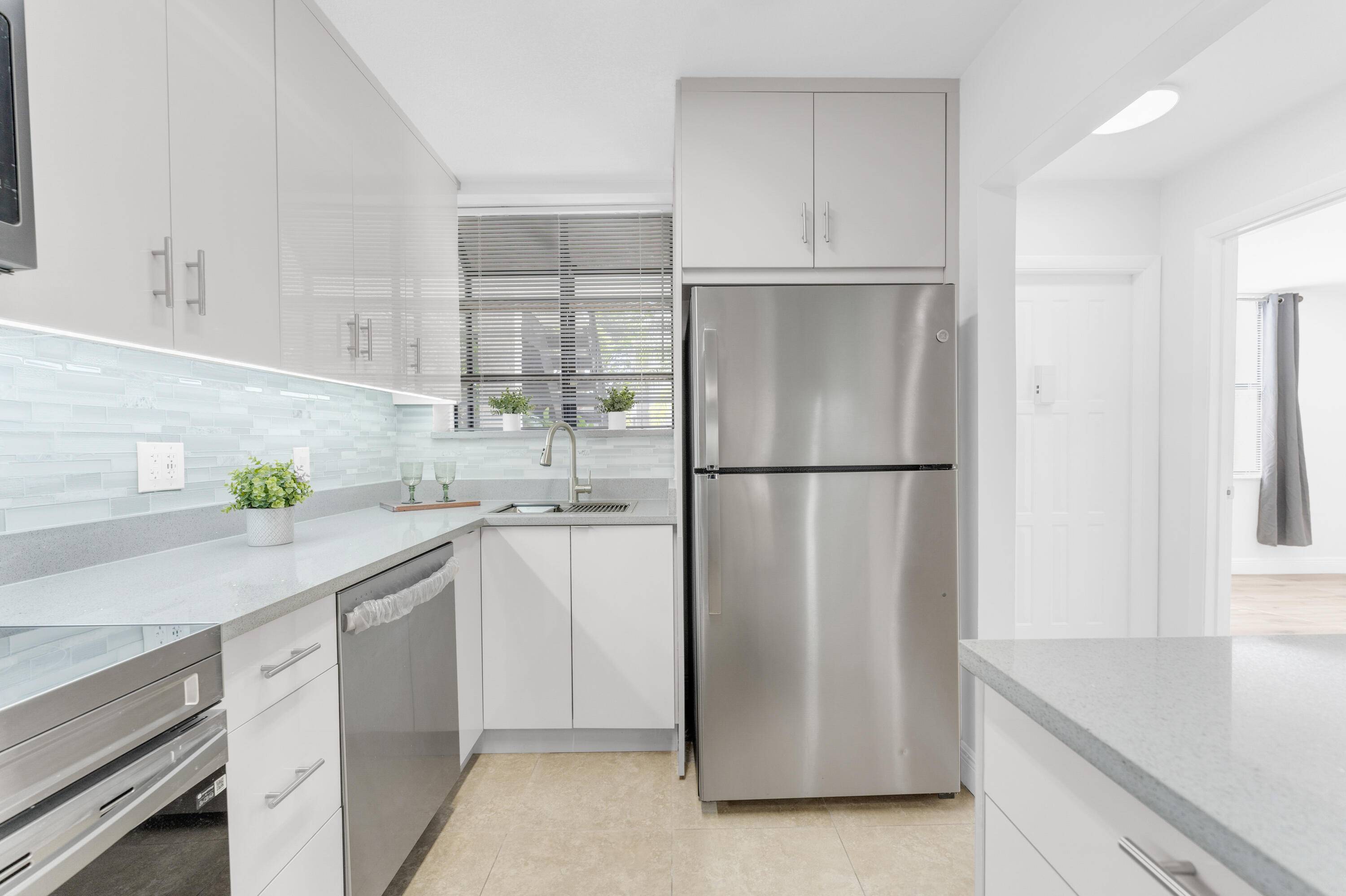 Come and see this beautifully remodeled first floor condo is move in ready and located in a desirable, all ages gated community just minutes from the beach, major highways, and ...