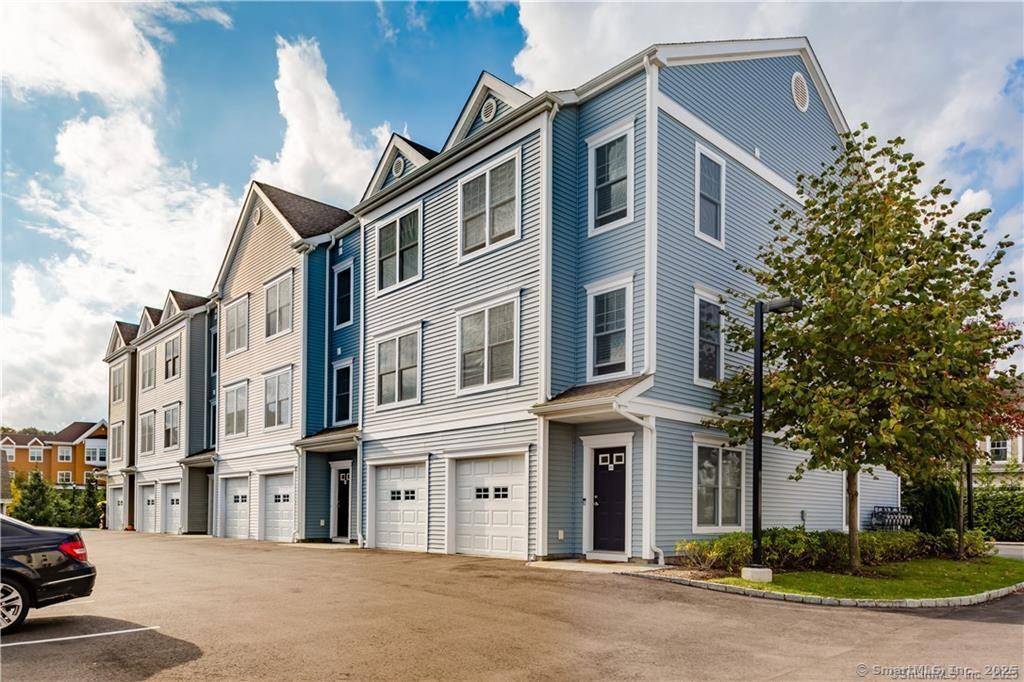 Fern style three level Copper Square townhouse ready for its next owner.