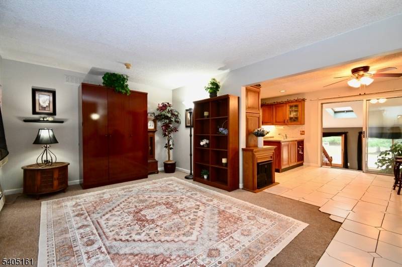 Welcome to this beautifully maintained 3 bedroom, 2 bath, 1 car garage expanded Custom Cape Cod offering comfort, flexibility, and an ideal location.