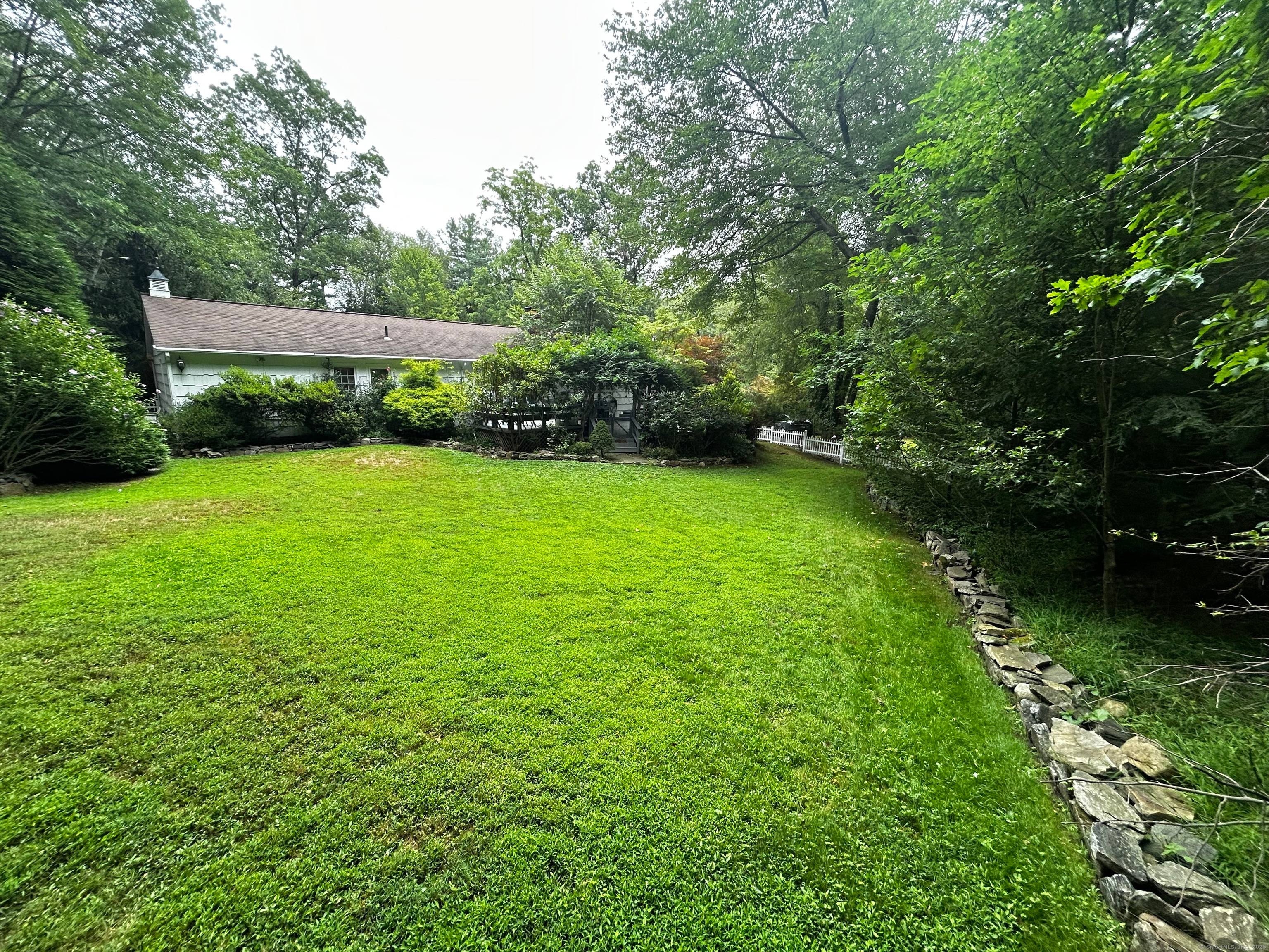 Discover the ease of one level living at 2180 Cross Highway, perfectly situated in a convenient Fairfield location on the Westport border.