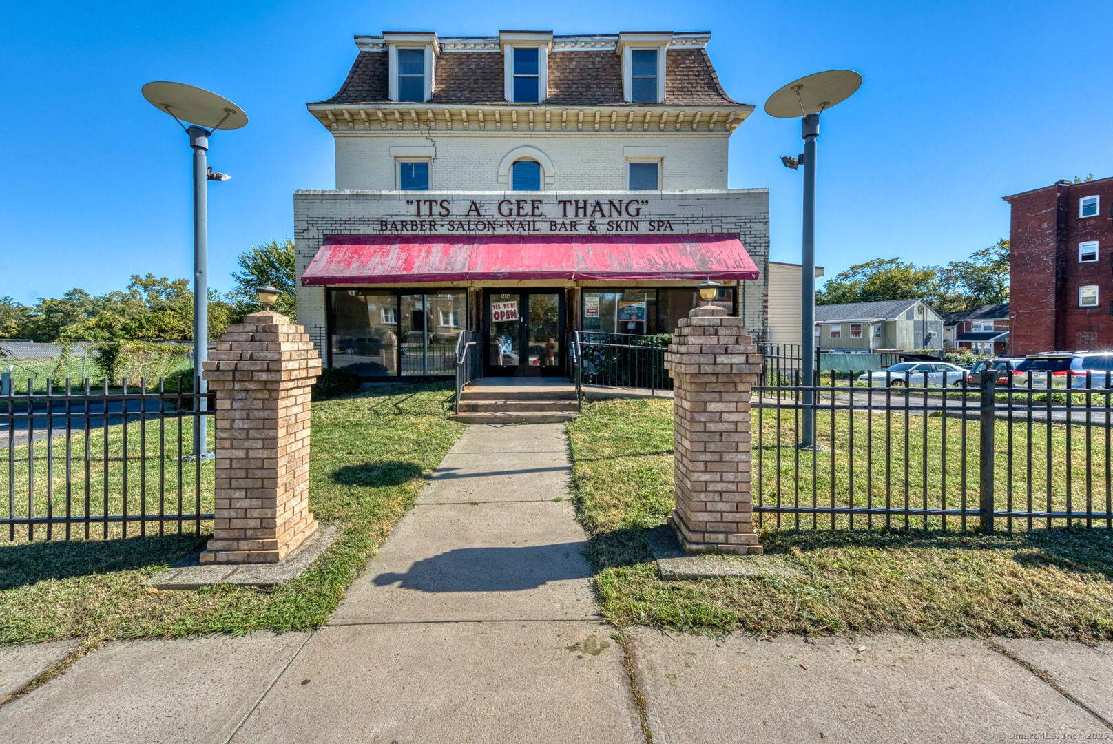 Step into a legacy of style, wellness, and community at 2404 Main Street, a multi level commercial gem in the heart of Hartford.