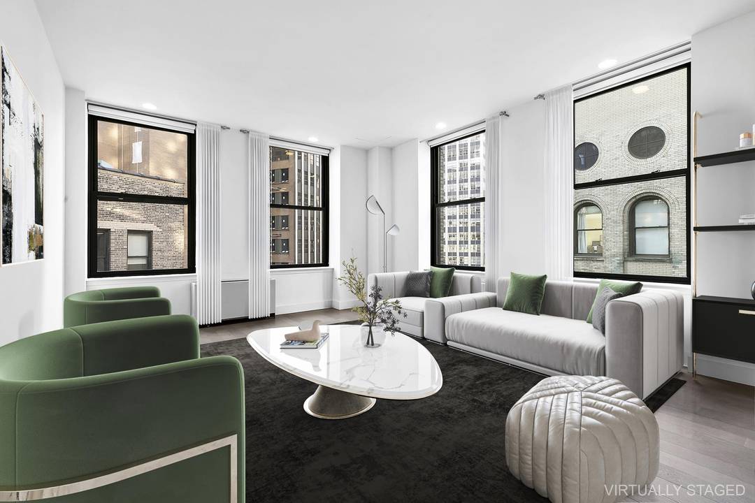 Luxurious Two Bedroom Two Bath Powder Room Condo Experience urban elegance at The Broad Exchange Building.