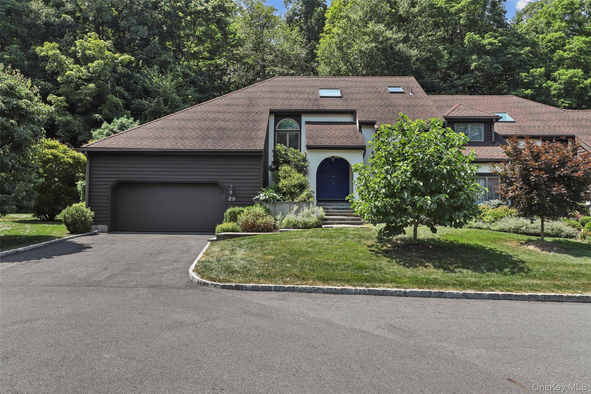 Welcome to 29 Cotswold Dr, a meticulously maintained single family townhouse in North Salem, blending modern sophistication with serene natural beauty.