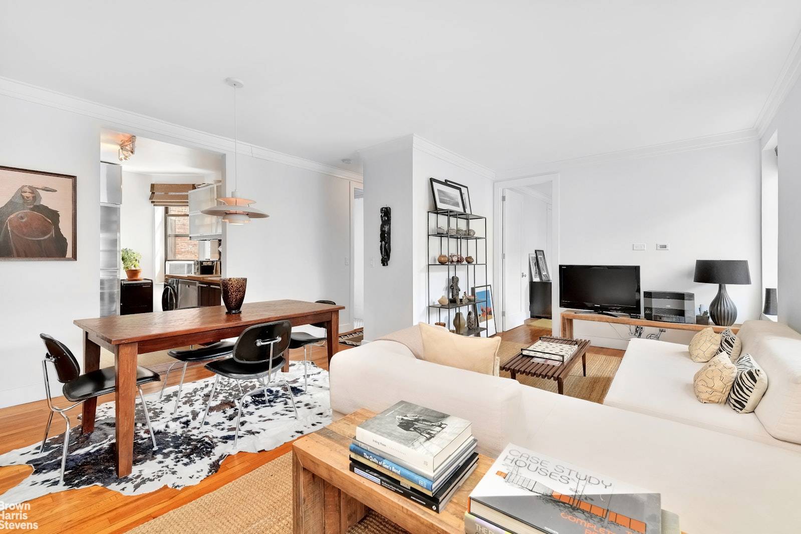 Pre war elegance meets sleek modernity in this spacious two bedroom apartment in the historic Ogontz building in Morningside Heights.