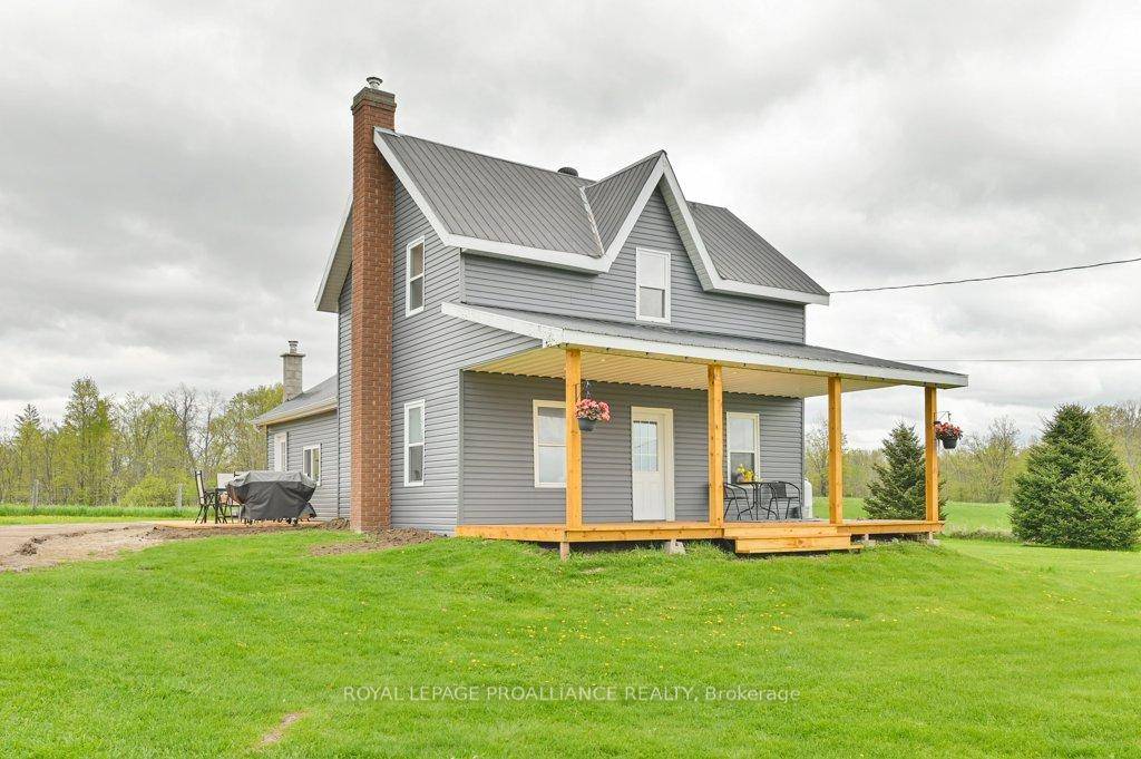 Escape to the country with this beautifully updated 3 bedroom, 2 bathroom farmhouse set on a private 1 acre lot.