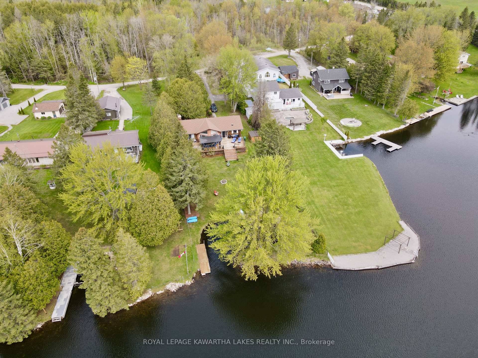 Come Experience The Kawartha Lakes With This Spacious 4 Season Waterfront Home on Mitchell Lake With Direct Access to Balsam Lake on the Trent Waterway System with Endless Boating.