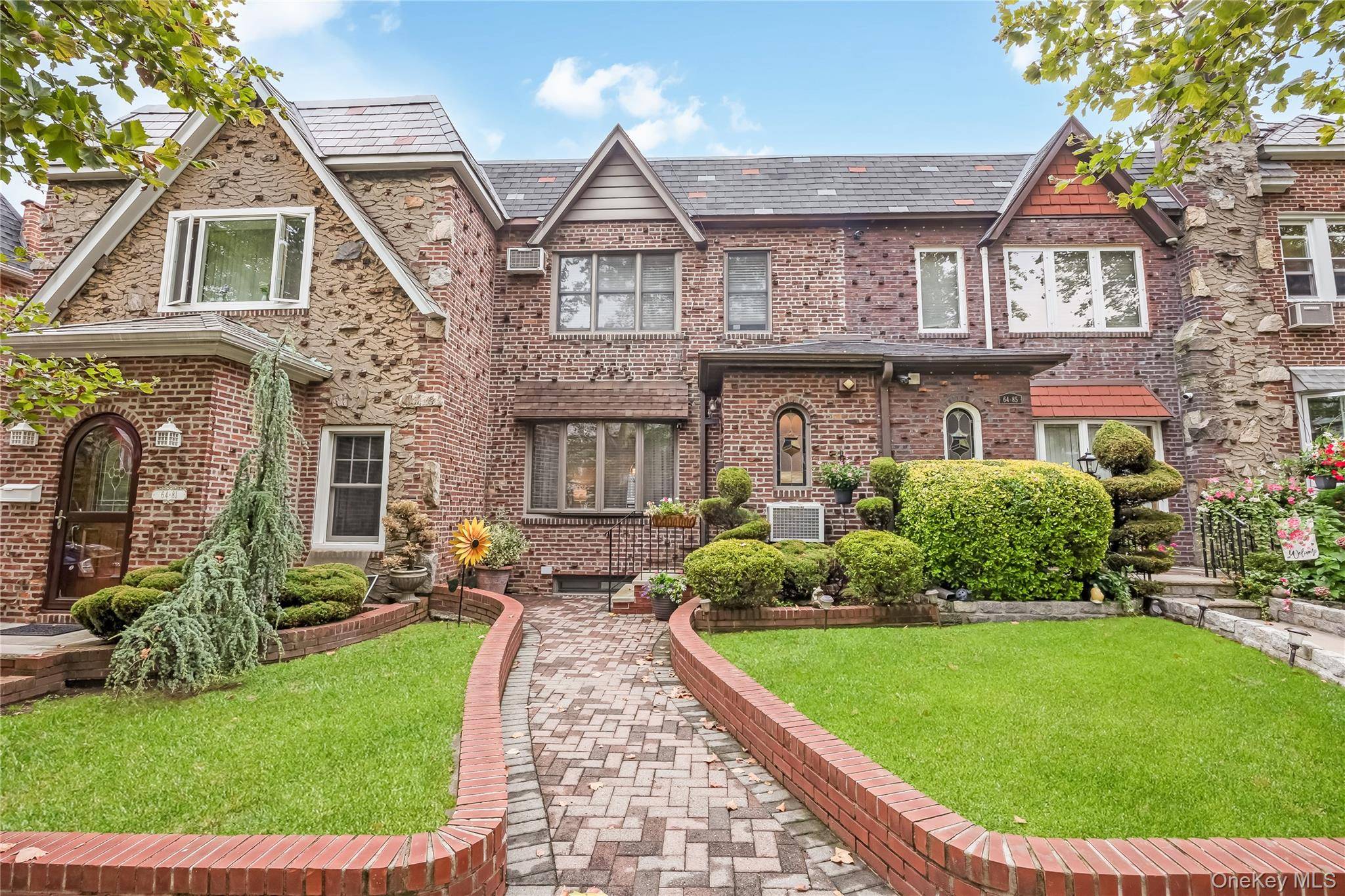 Welcome to this stunning one family brick Tudor, perfectly located in the heart of Middle Village near beautiful Juniper Valley Park and convenient transportation.