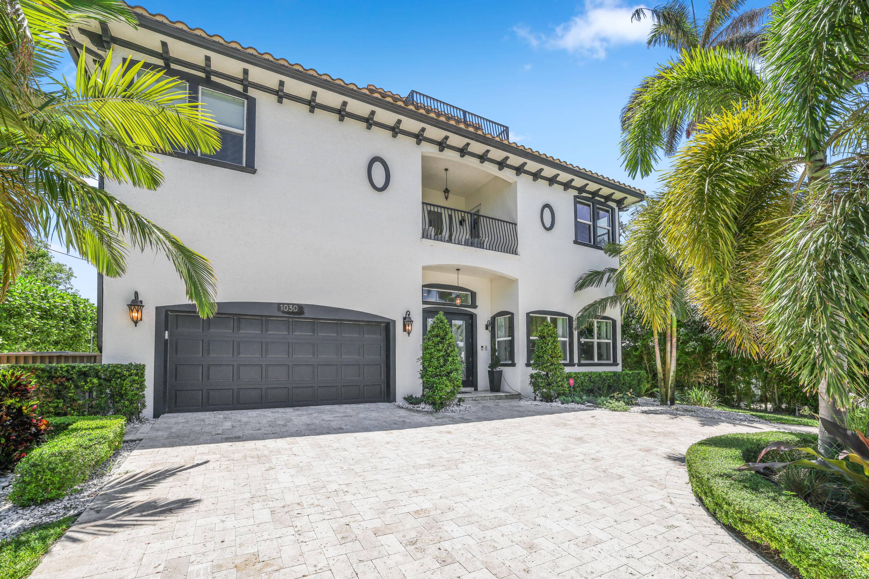 Step into coastal luxury with this beautifully remodeled waterfront home, offering 75 feet of frontage, a private dock, and just 300 steps to the beach.