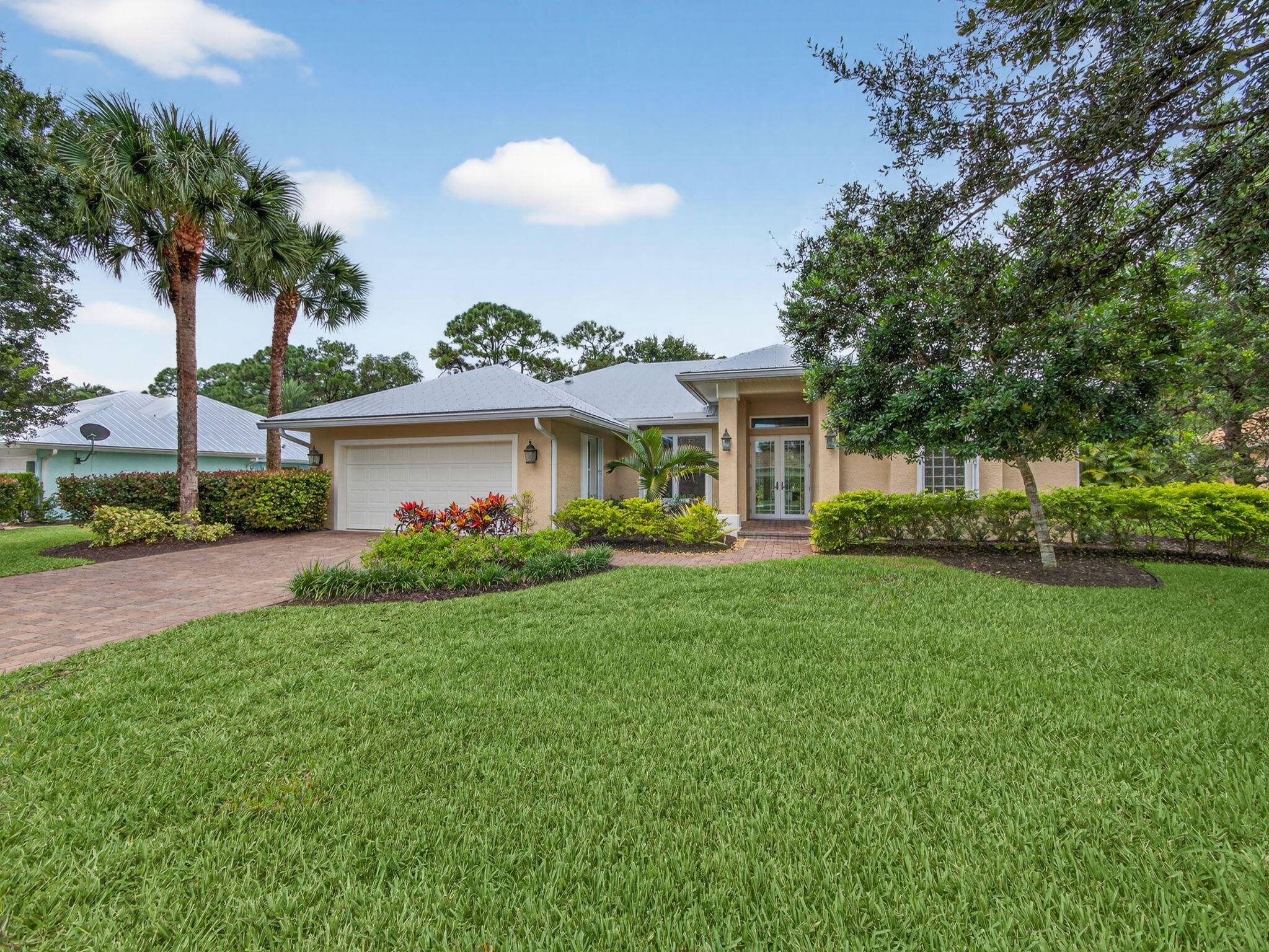Beautifully maintained 3 bedroom, 2 bath, 2 car garage home with a new metal roof 2022 and a new AC 2024.