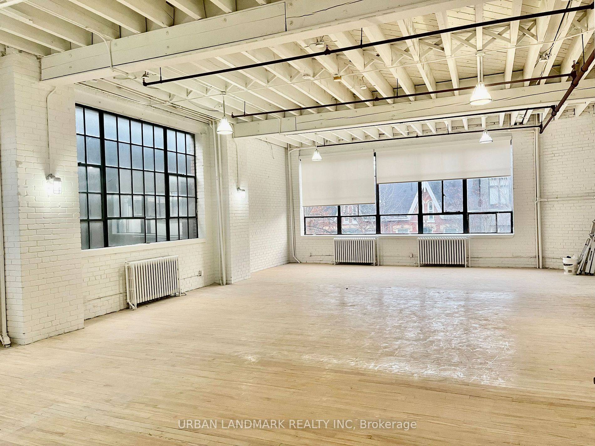 Graffiti Alley West, factory style office, 2nd floor walk up, freight access, truck level dock, open plan, private washroom and kitchen.