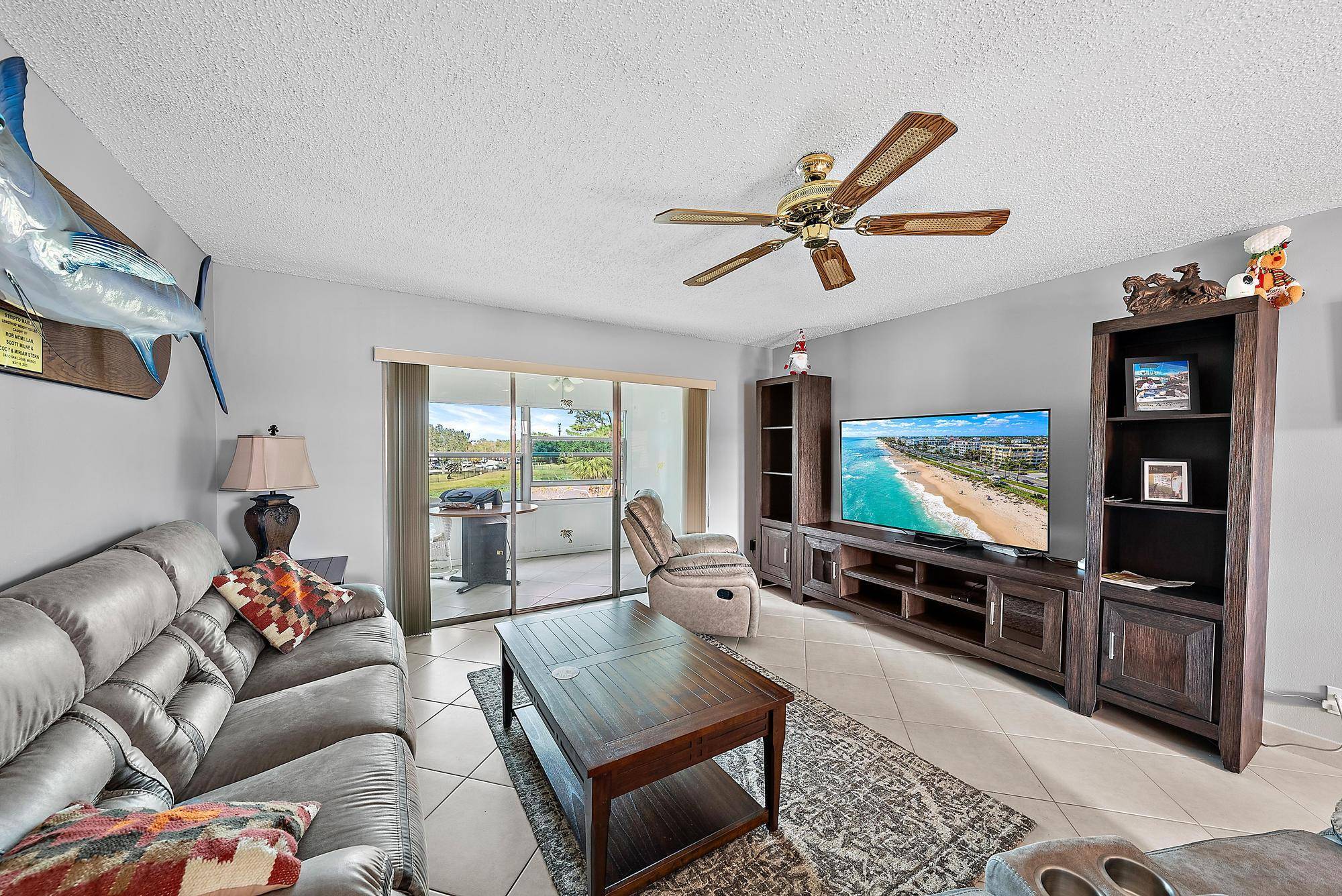 Welcome home to this turn key fully furnished, light and airy 2 bedroom, 2 bathroom condo in the highly sought after Lakeside Village community.