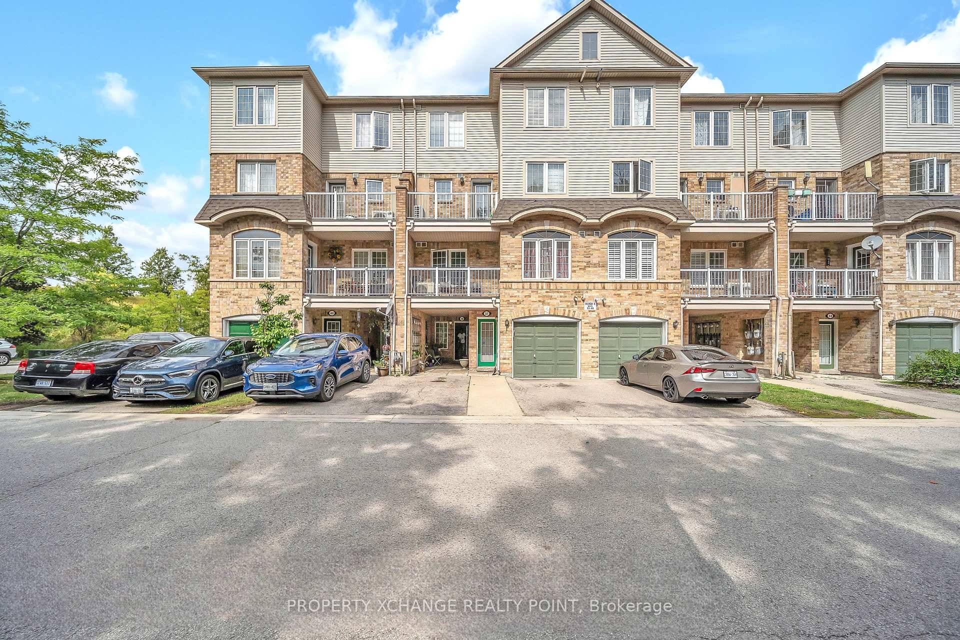 Why Pay Rent When You Can Own This Beautiful Boutique Style 2 Bedroom Condo Townhome In Woodside Village ?
