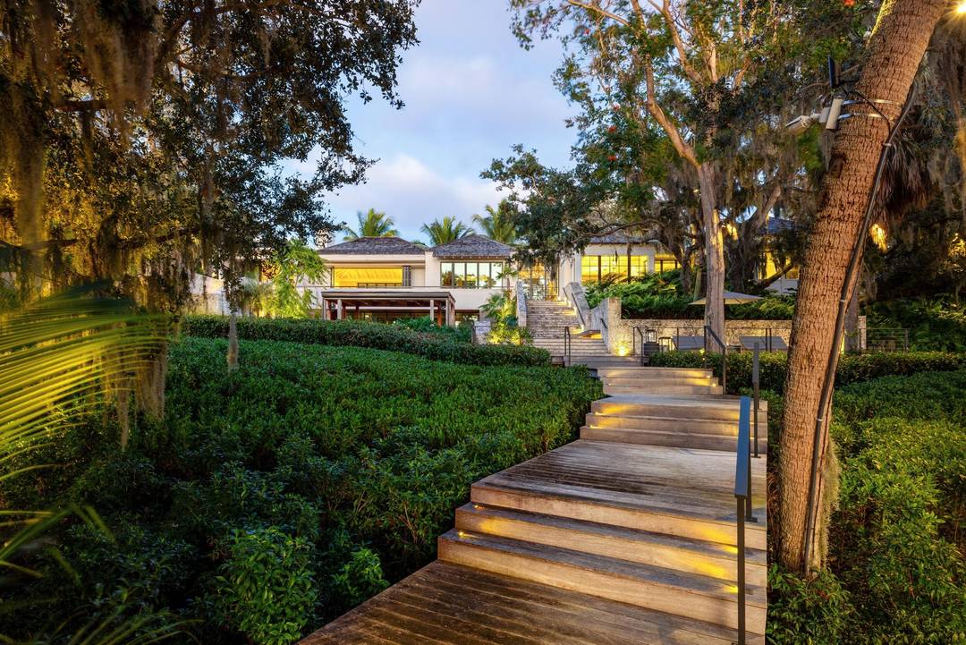 Known as River House, this newly completed riverfront estate of international distinction is elevated atop a commanding 30 foot bluff in Sewalls Point, spanning 4.