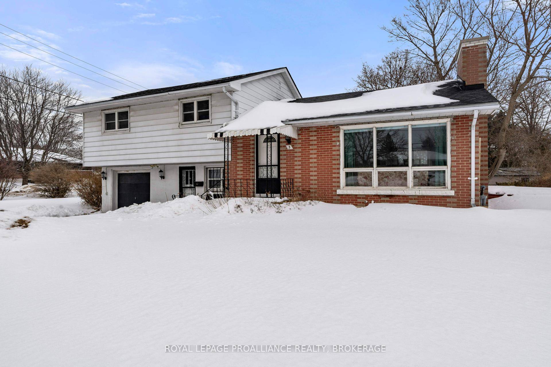 Welcome to 3 Fairfield Blvd, a spacious 3 level sidesplit on a large corner lot in Amherstview, offering scenic views of Lake Ontario.