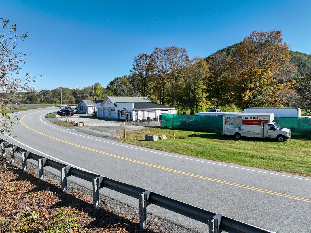 Discover a rare opportunity in the heart of Salisbury with this exceptional mixed use property at 105 109 Route 7, offering a perfect blend of commercial versatility and residential comfort.