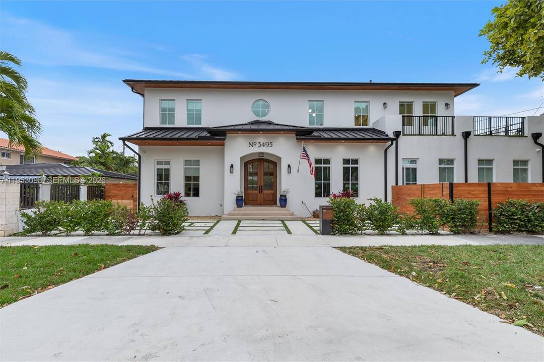 Stunning modern residence in the heart of Miami offering a total of six bedrooms and five and a half bathrooms, thoughtfully designed for style, comfort, and versatility.