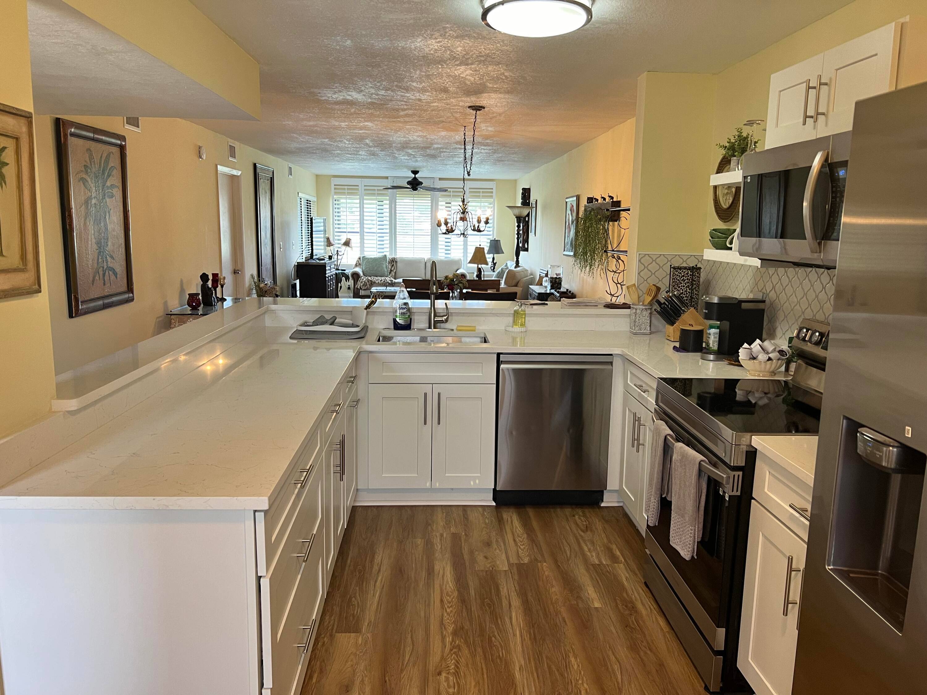 Welcome to this stunning 2 bedroom, 2 bathroom condo with breathtaking panoramic views of the Forest Oaks Golf Course.