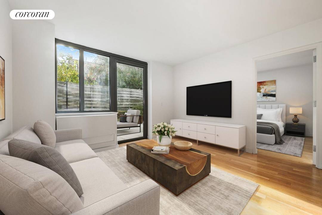 Make Williamsburg your home with this two bed two bathroom apartment a huge private outdoor space.