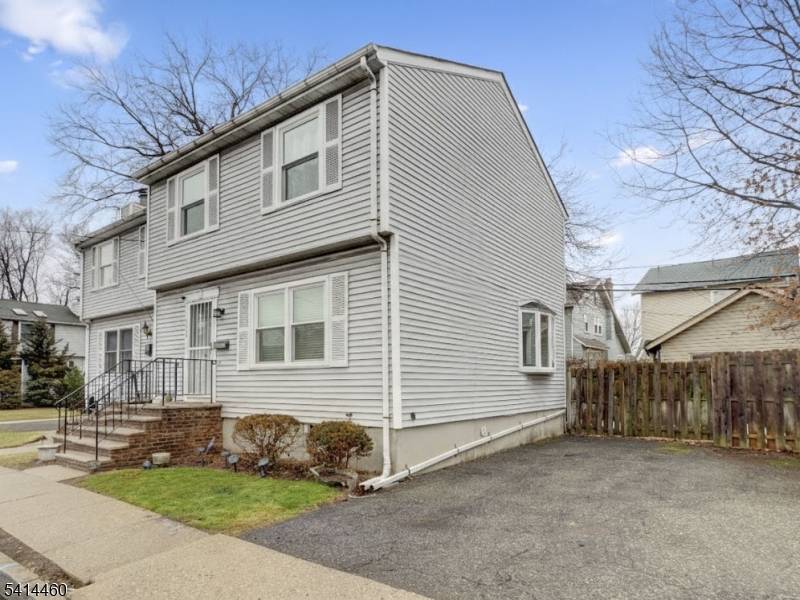 Welcome to this beautifully maintained 3 bedroom townhouse condo located on the desirable north side of East Orange, NJ.