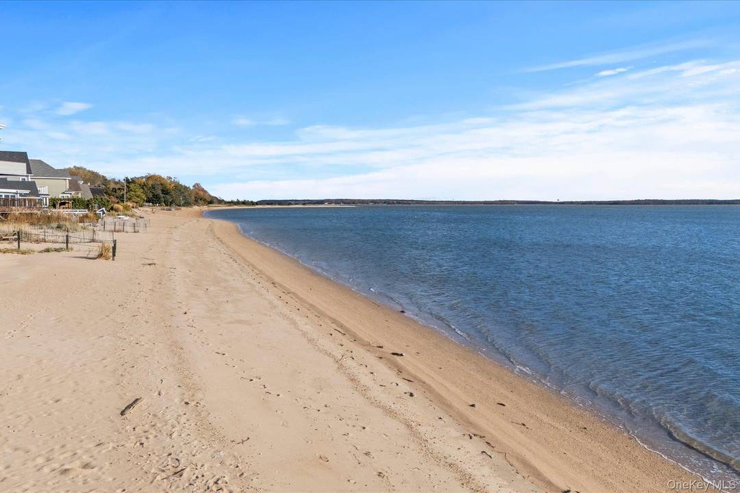 This exquisite turn key coastal retreat offers the perfect blend of style, comfort, and convenience just steps from one of the most beautiful stretches of sandy beach on the North ...