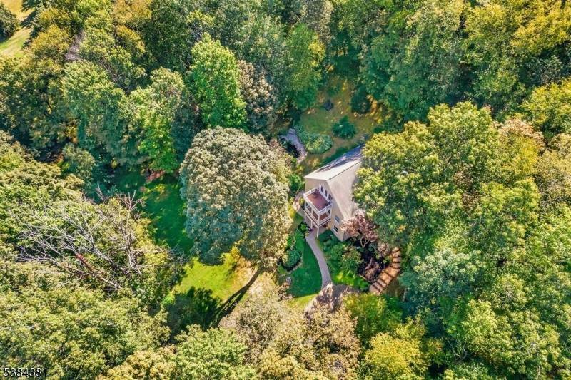 This stunning custom, exceptionally well cared for home in Washington TWP Morris Co, is perfectly situated on 4.