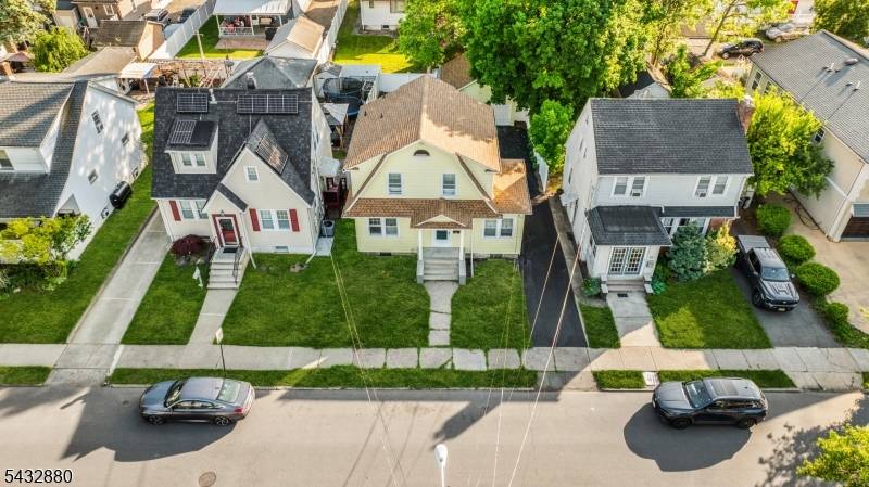 Welcome to this totally renovated 4 bedroom, 2 full bath Colonial located in the desirable Hillcrest section of Paterson.