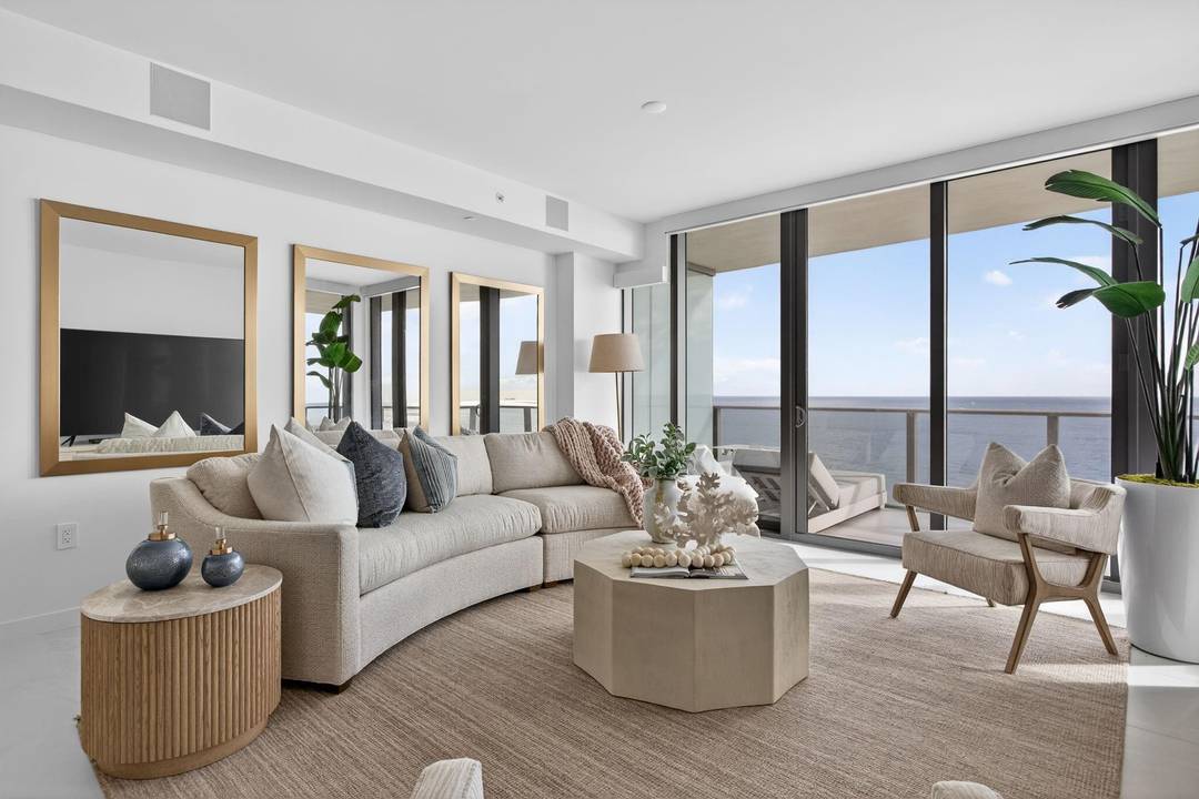 Stunning Southeast corner beachfront residence at Solemar with a premier flow through layout offering 3 bedrooms, 3.