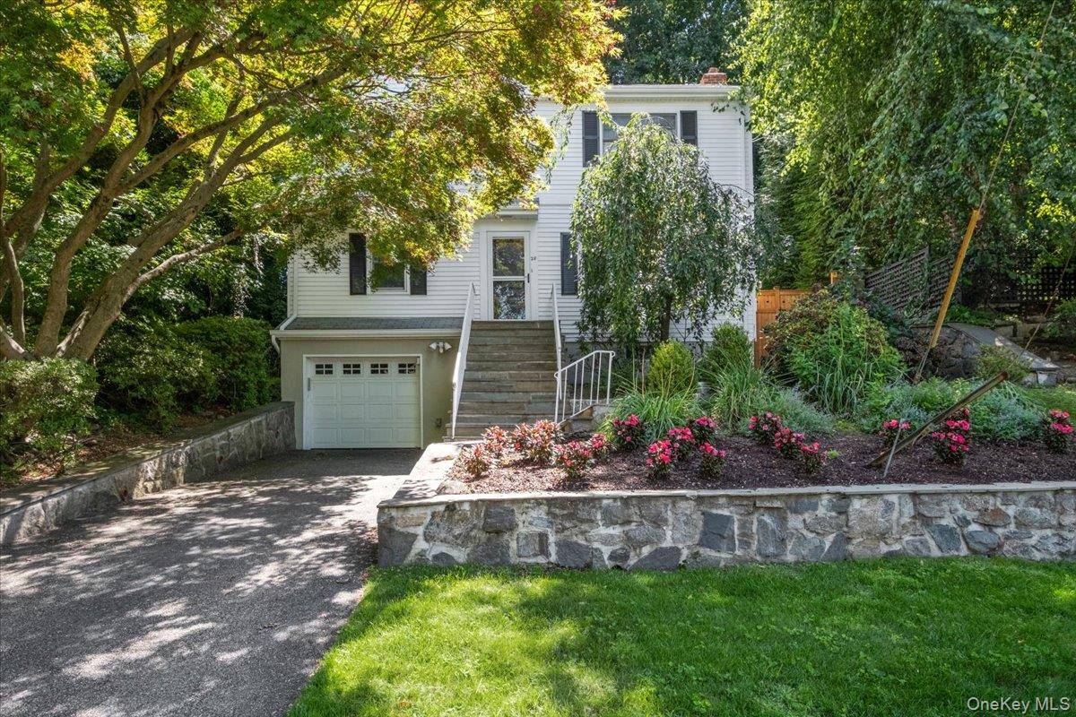 Welcome to this warm and inviting 4 bedroom, 2 full bath Colonial, thoughtfully updated and full of character.