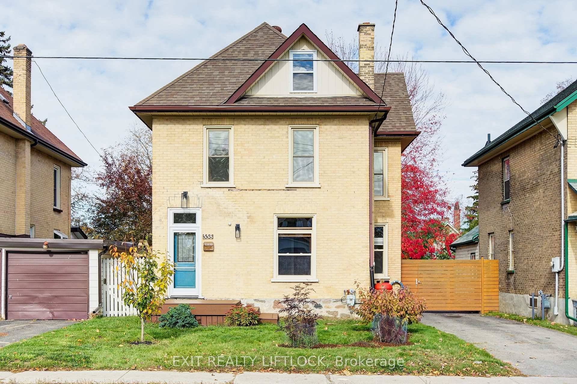 This 2. 5 storey all brick century home is full of character and warmth.