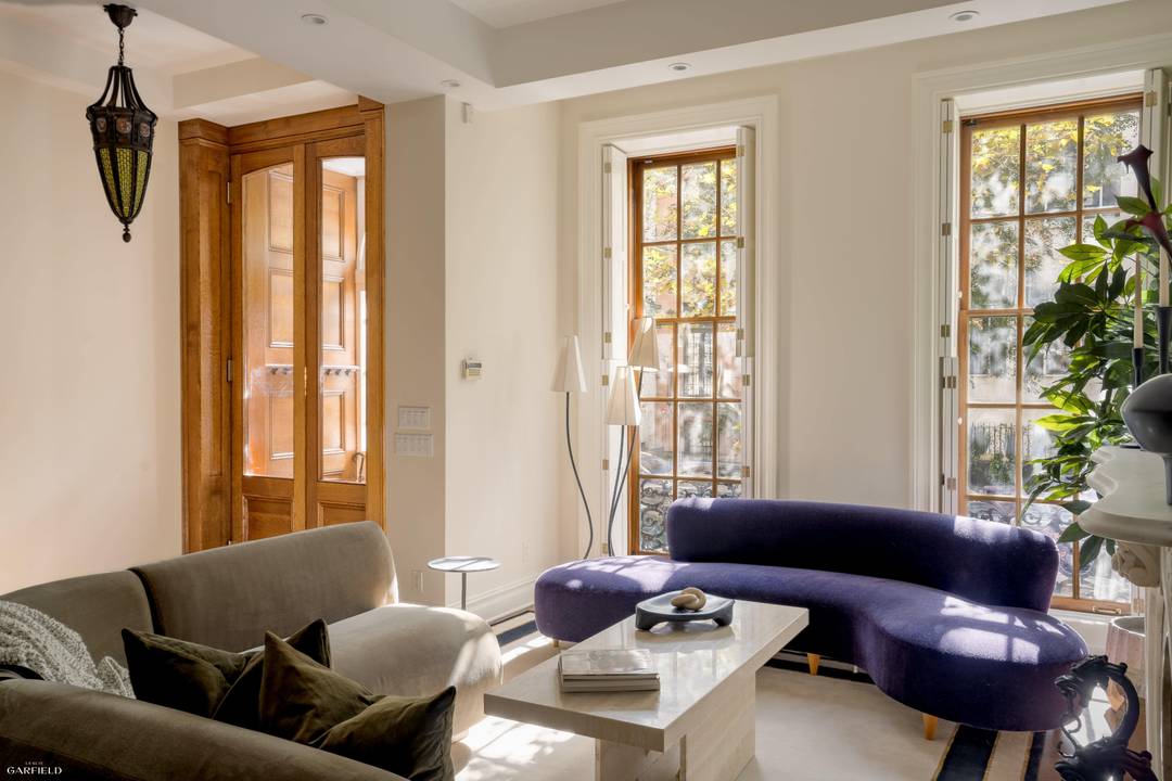 Nestled on one of Manhattans most storied and picturesque blocks, this renovated single family townhouse offers the rare combination of historic charm and modern upgrades.