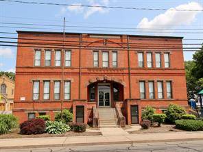 Great opportunity to convert into residential apartments, this grand brick two story building, originally constructed as Our Lady of Mt.