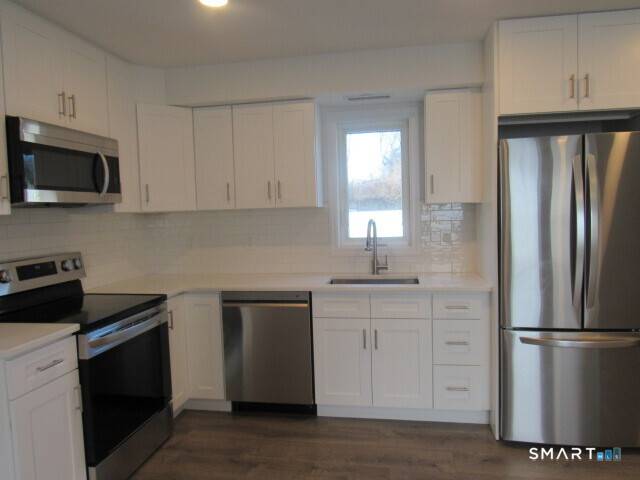 Spectacular multi level townhouse in the heart of vibrant SoNo.