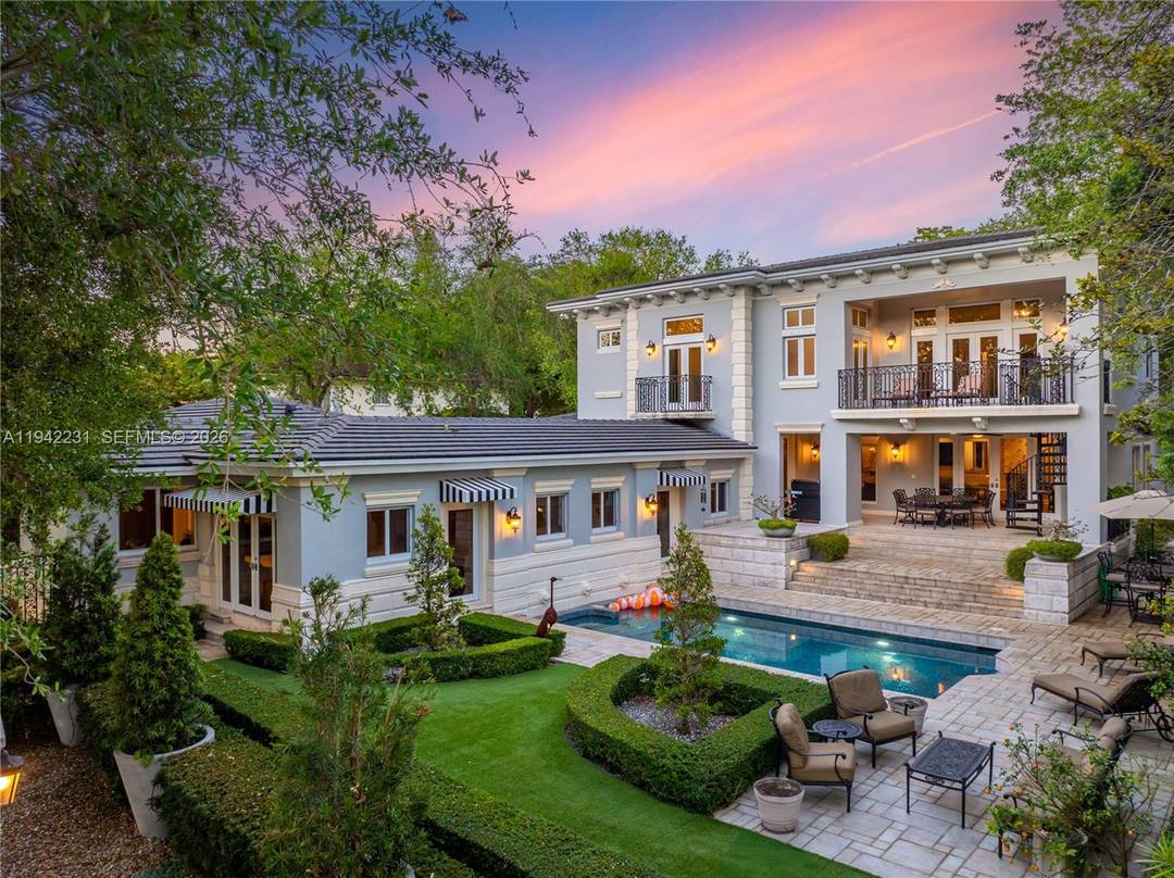 Gables Grandeur ! Immaculate French inspired estate directly on the Gables waterway amp ; prestigious Biltmore Golf Course.