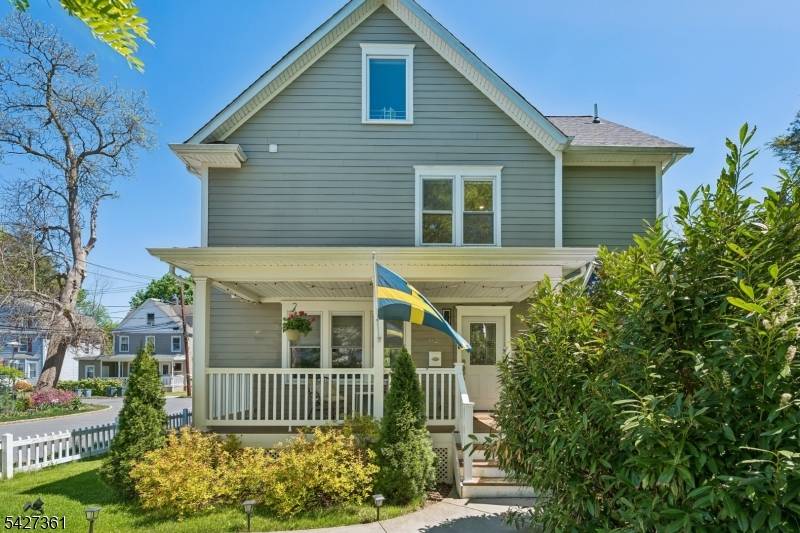 Situated on a beautifully landscaped property, this completely renovated 3 story colonial home enjoys an ideal location in the desirable section of Summit, just a 0.