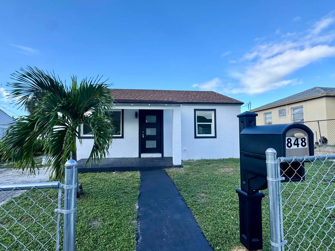 Completely renovated 3 bedroom, 2 bath home featuring beautiful ceramic tile throughout, impact windows and doors, and an open, modern floor plan.