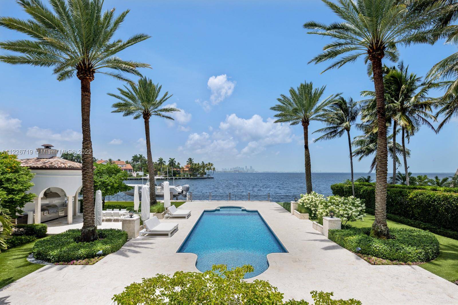 Exclusive Waterfront residence in the highly coveted gated community of Tahiti Beach.
