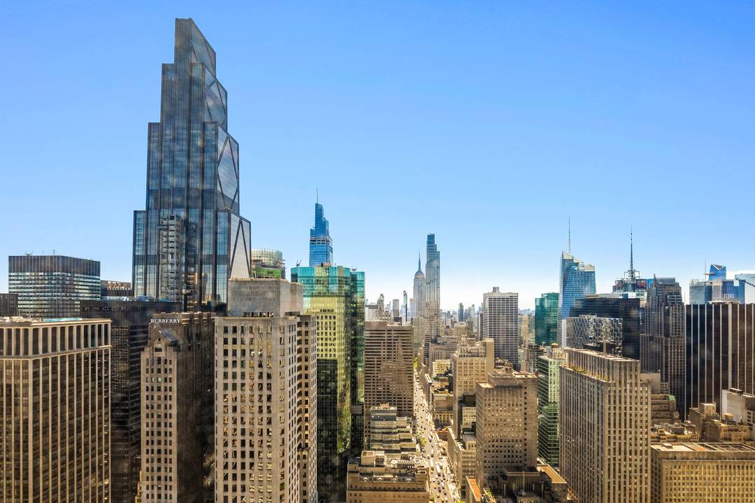 DISCOVER YOUR DREAM LOFTLIKE HOME HIGH IN THE SKY ON THE 45TH FLOOR OF THE ICONIC OLYMPIC TOWER !