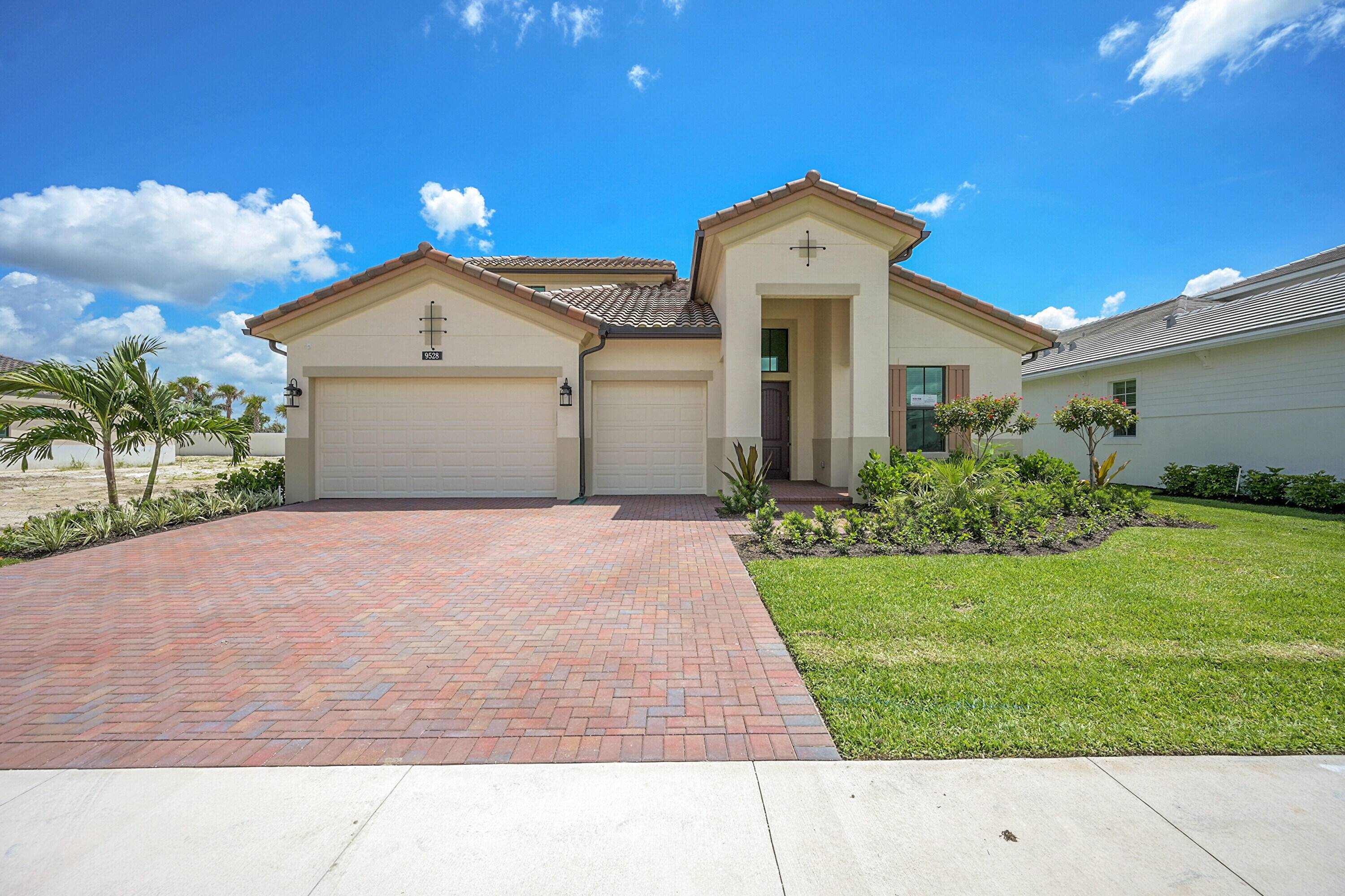 The Paige floorplan, built by Kolter Homes, is located within the gated community of L'Ambiance at Avenir.