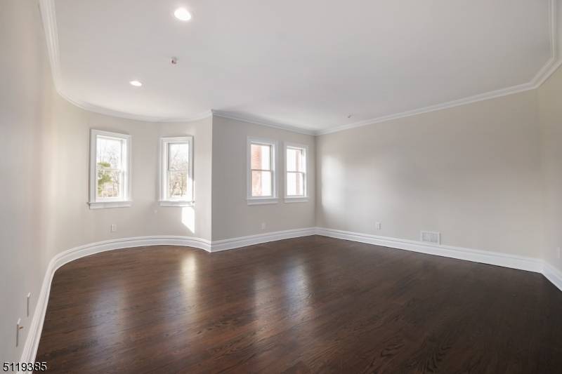 Location ! Newer luxury condo with 1238 SF, chic and stylish with stunning millwork, architectural details, quality craftsmanship and beautiful hardwood floors throughout.