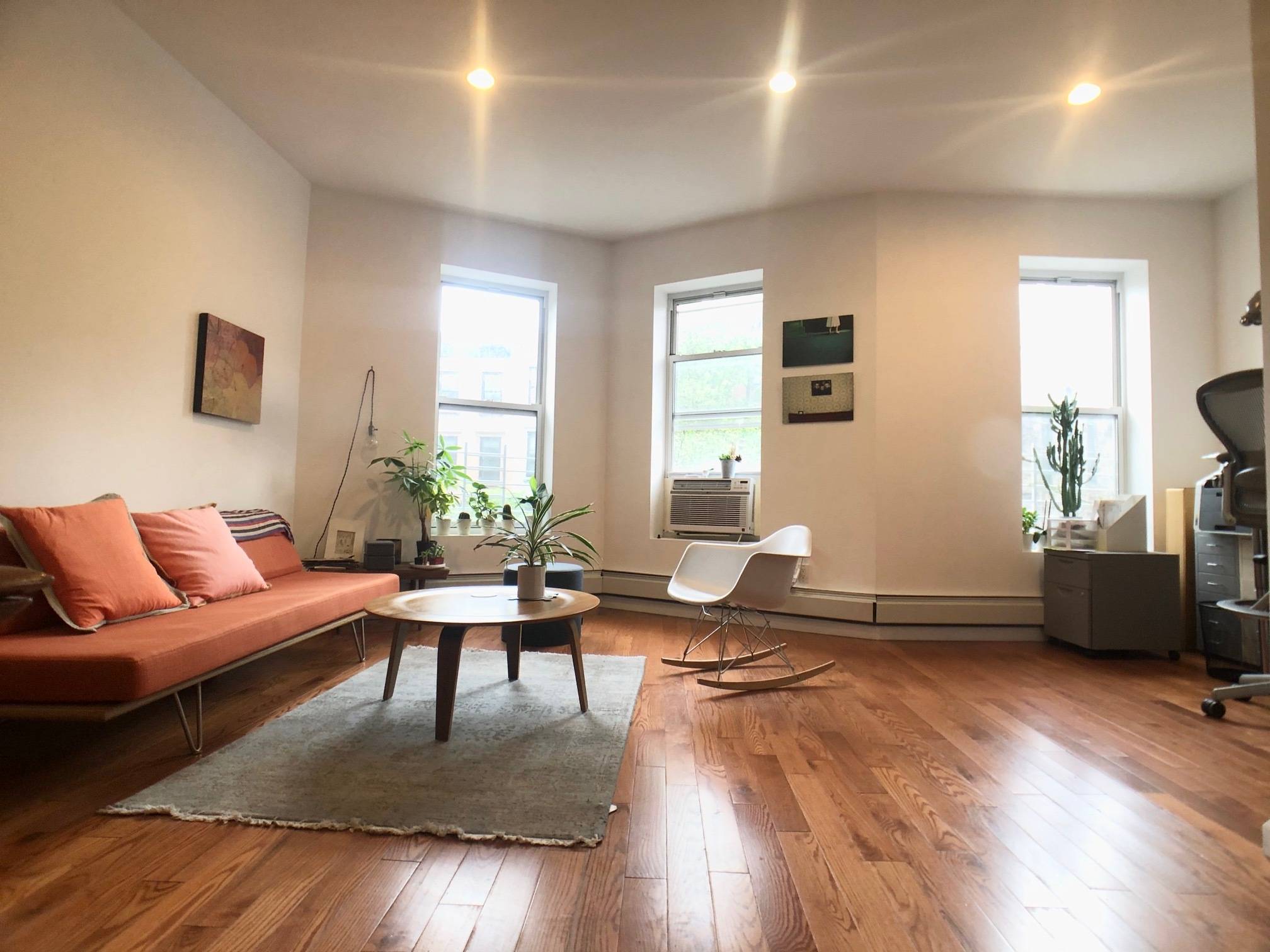 Rare find. Stunning loft like 2nd floor townhouse apt with PRIVATE DECK.