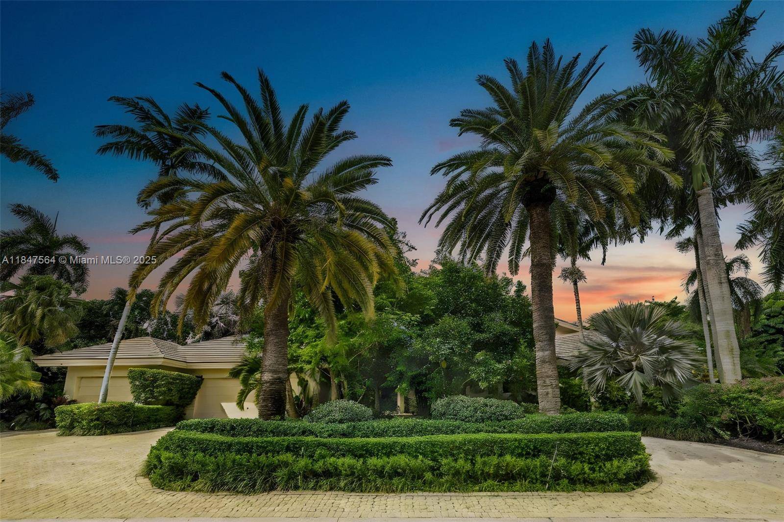 Boca Grove s most prestigious estate is located on a corner lot in the Rosedown Ct.