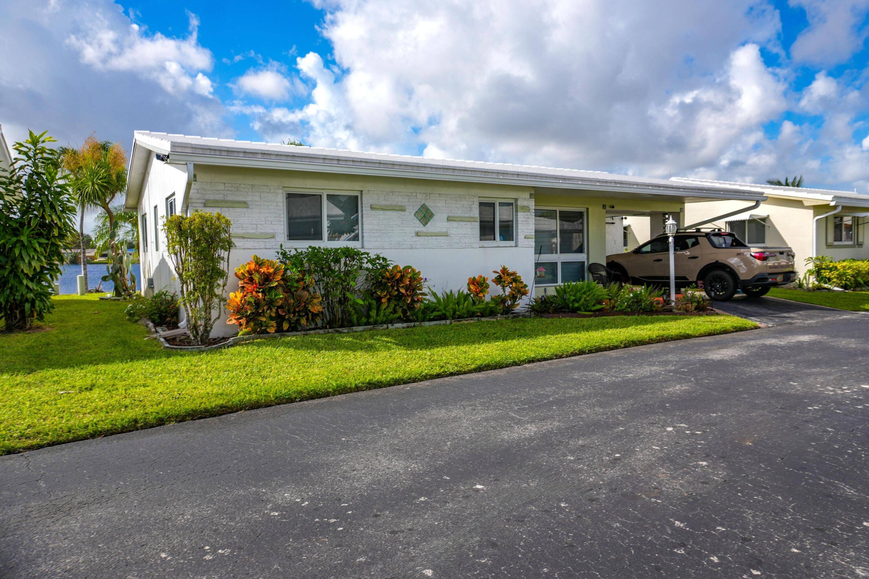 Embrace the epitome of lakeside living in this remodeled 2 2 villa, where you can enjoy a serene and rejuvenating lifestyle.
