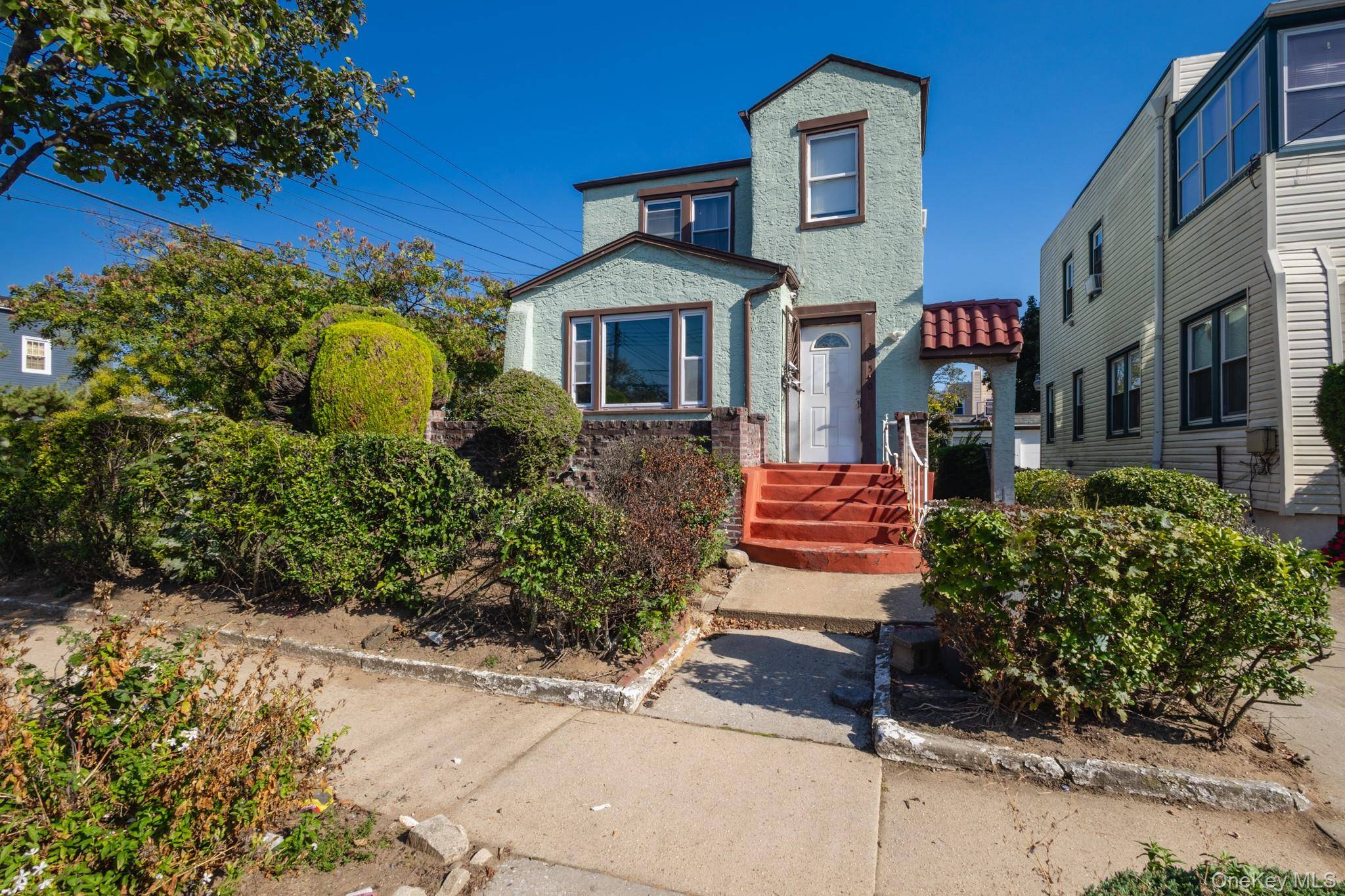 Sunny Detached Colonial on a Corner Lot amp ; Located in the Heart of Laurelton Springfield Gardens.