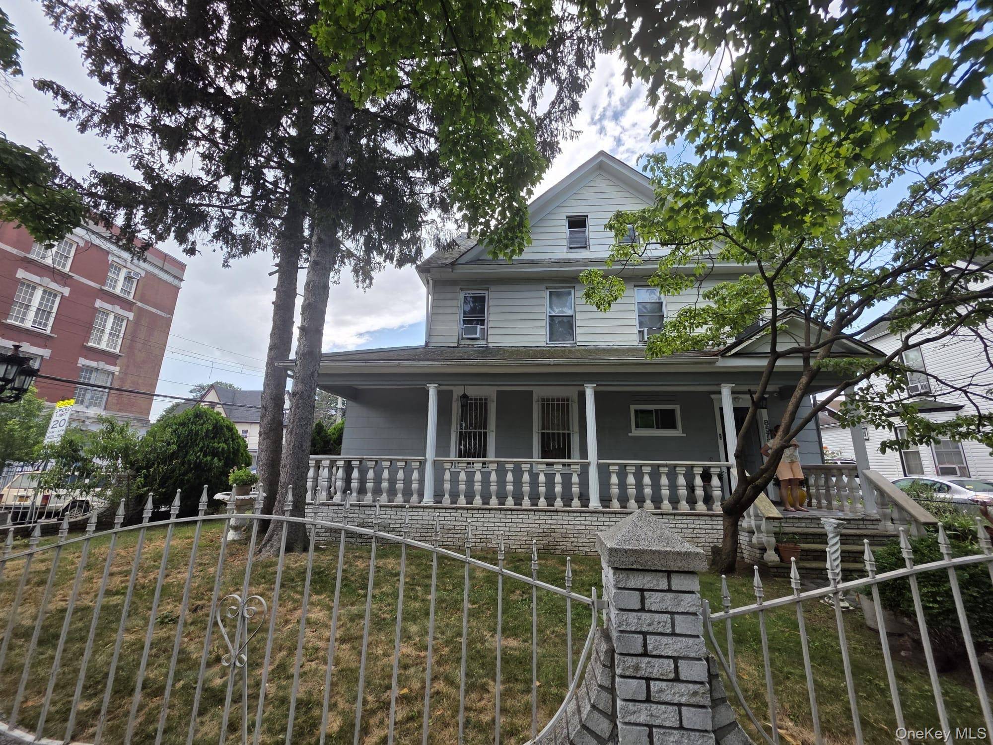 Charming and spacious legal two family home in the heart of Richmond Hill !