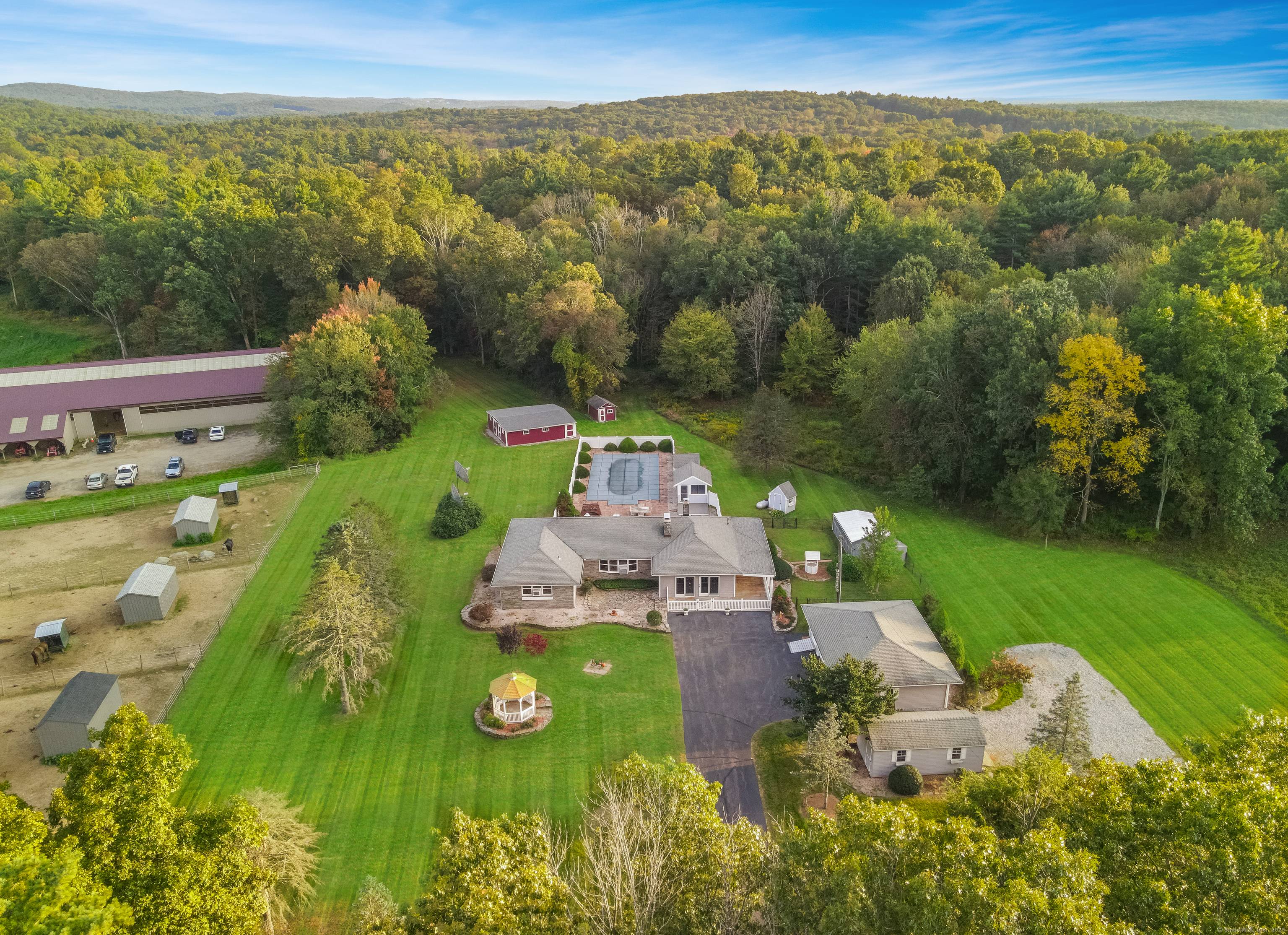 Offered at 1, 000, 000, this 29 acre country estate in Willington, captures the perfect balance of tranquility, luxury, and equestrian living.