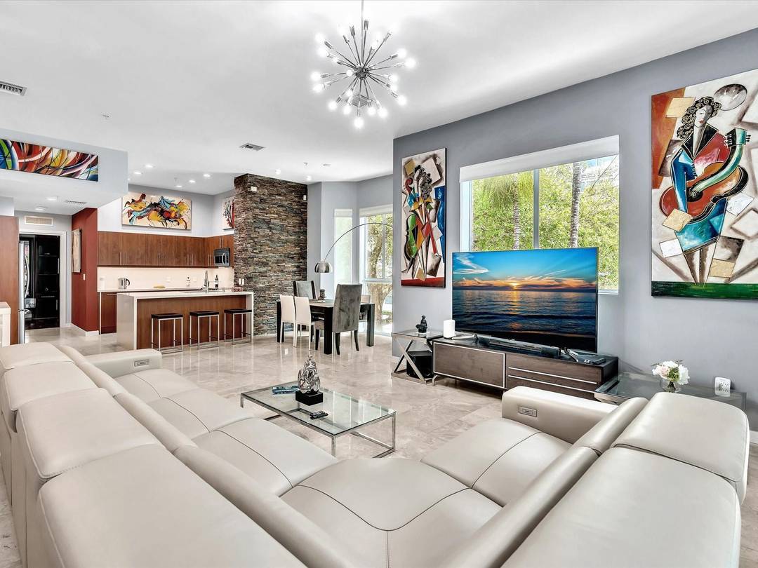 Elegant 4 story, fully furnished townhome with 50 paintings.