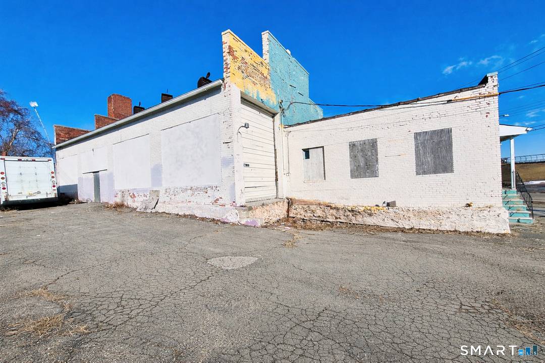 Efficient warehouse space designed for operational use, featuring one loading dock, one drive in garage door, and approximately 12 foot clear ceiling height, ideal for storage, distribution, contractor operations, or ...