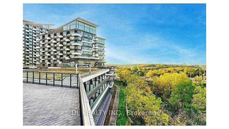 Welcome to this modern 1 bedroom condo with breathtaking, unobstructed south views of Lake Ontario and the CN Tower, right in the heart of Oakville's Uptown Core !