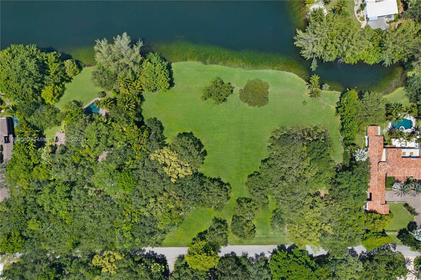 Rare opportunity to build your dream estate in Coral Gables exclusive guard gated community of Snapper Creek Lakes.